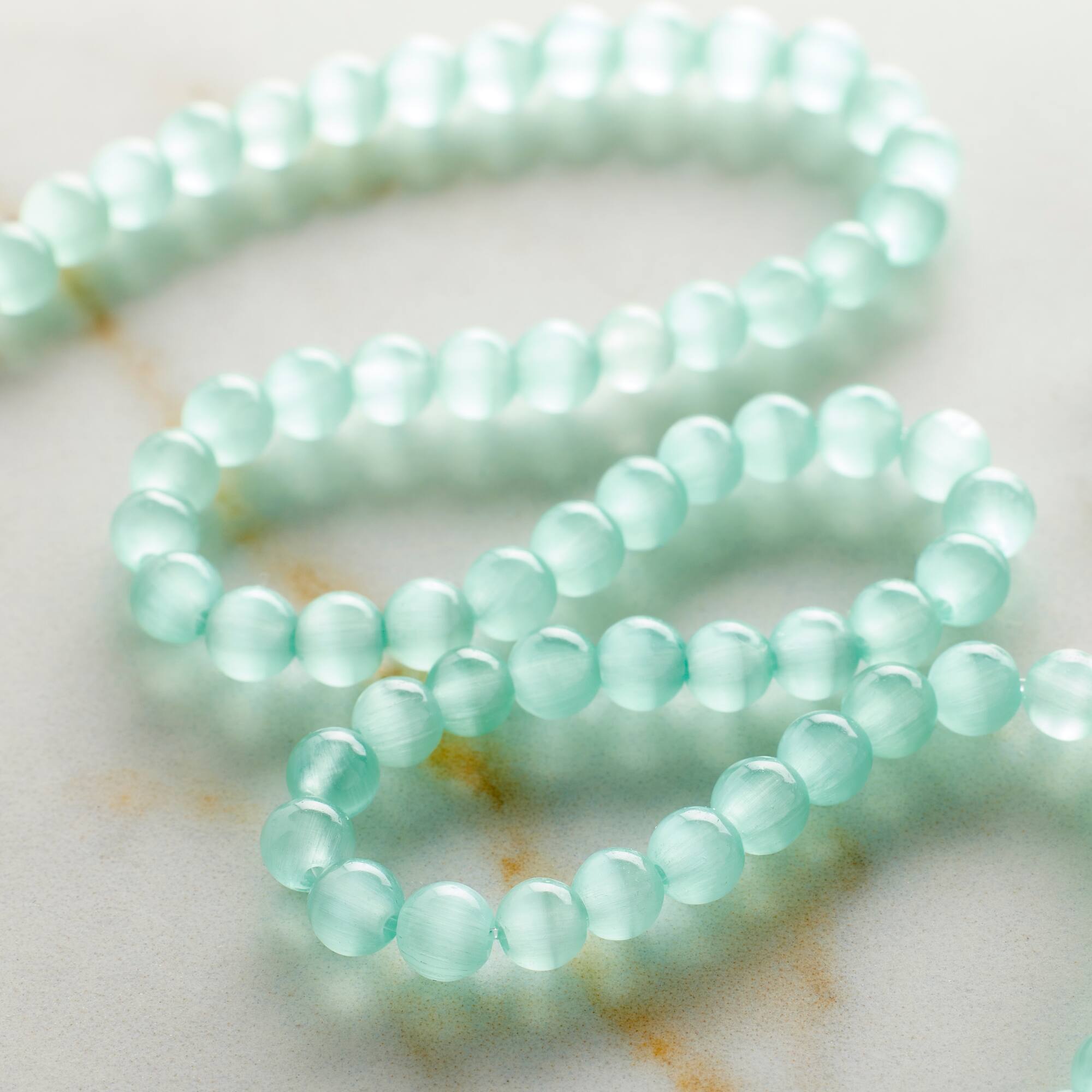 Aqua Cat's Eye Glass Round Beads, 4mm by Bead Landing™
